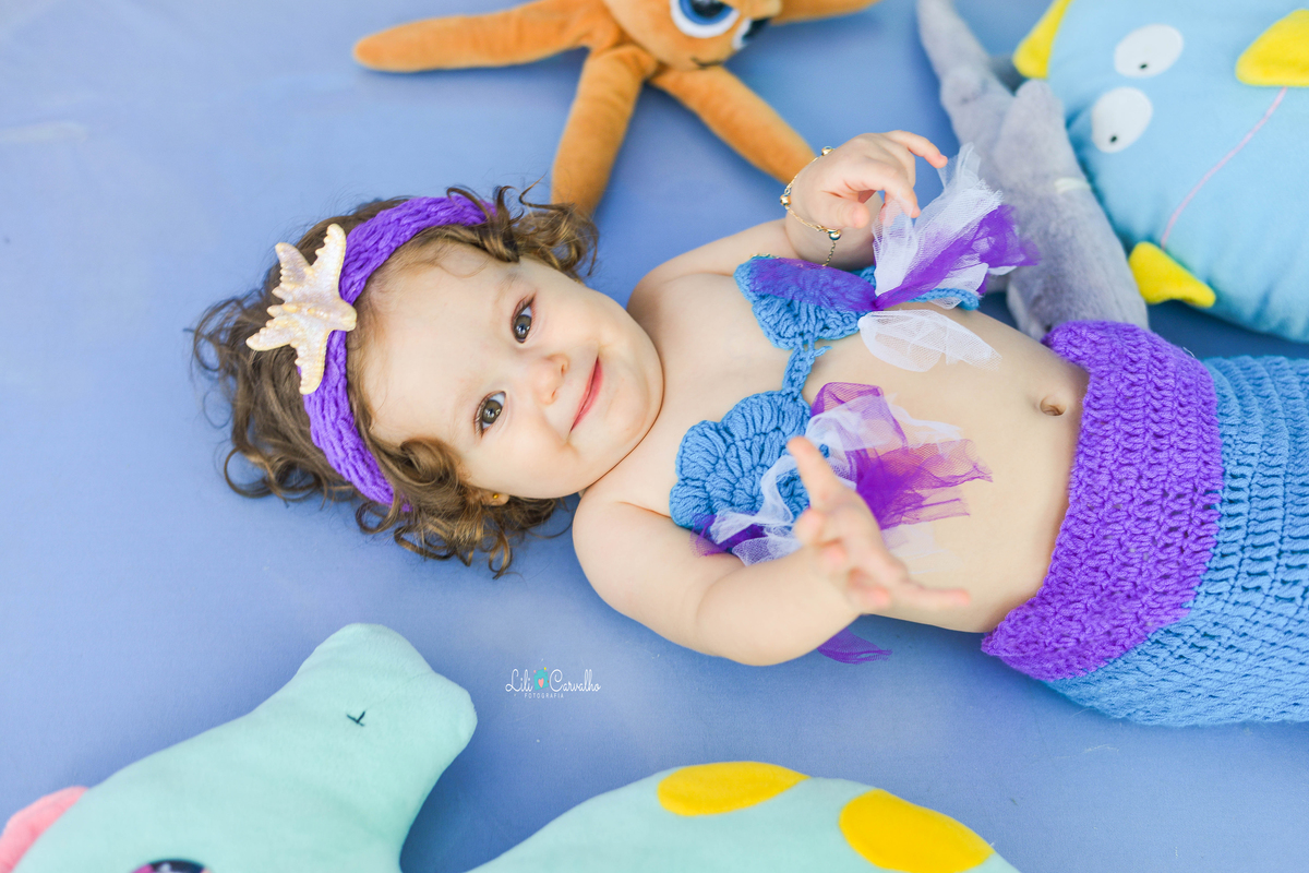 bebê deitada, tema ariel acompanhamento mensal  fotografico em Maringá