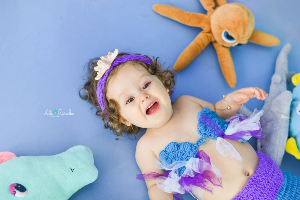 bebê deitada, foto infantil em maringa
