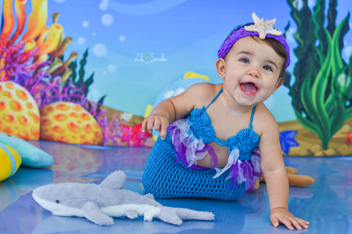 Foto de bebê no estudio em Maringá sorrindo