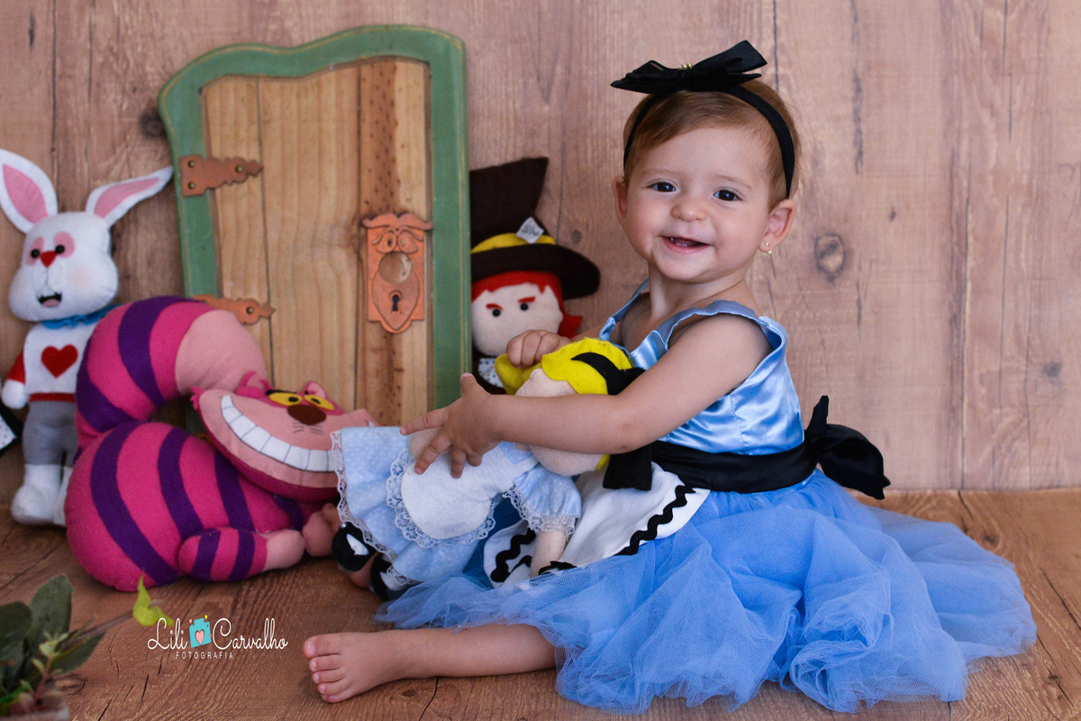 Fotografia de acompanhamento infantil realizada no estudio em Maringá bebe sorrindo 