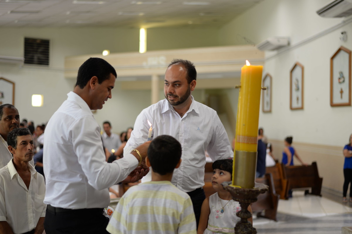 papai segurando a vela