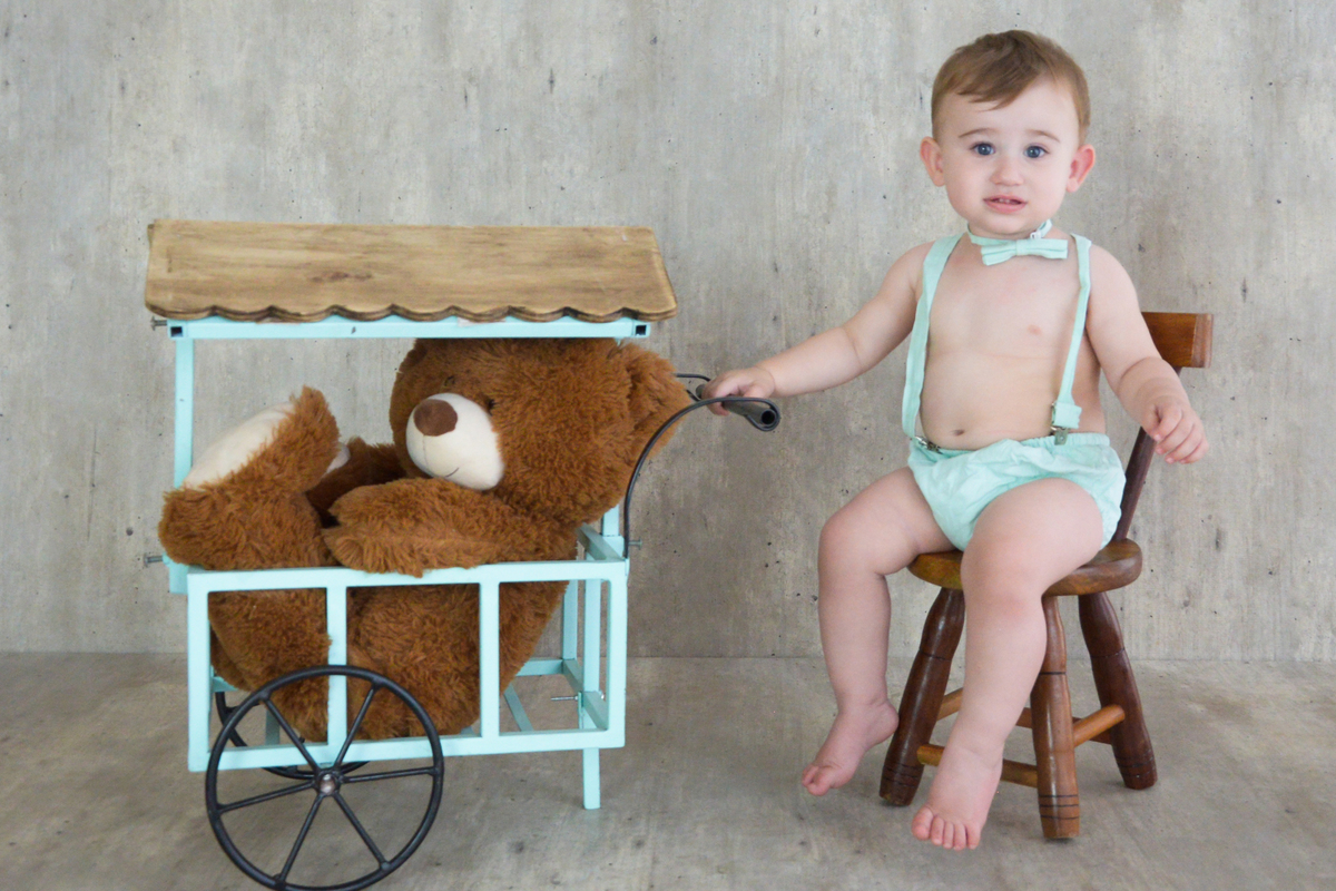 ensaio fotografico de menino em maringa verdinho agua 
