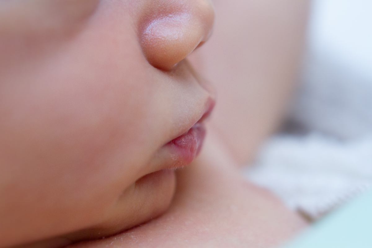 Esta foto mostra o biquinho que o João Henrique faz em todas as fotos