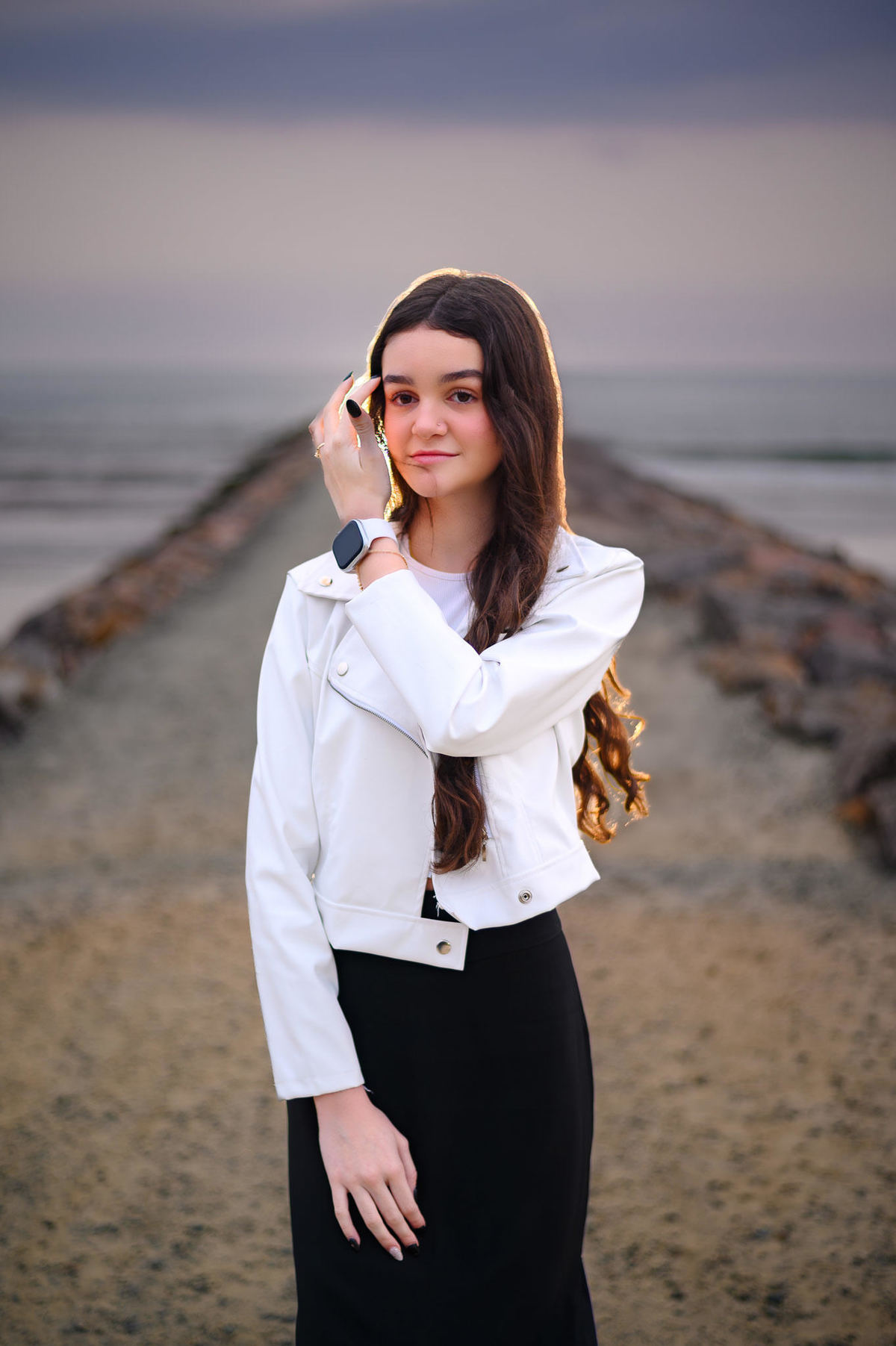 Foto de ensaio de 15 anos em Itapema SC com foco no rosto da debutante e fundo desfocado