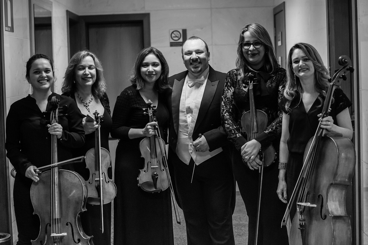 maestro, violinistas e violoncelista