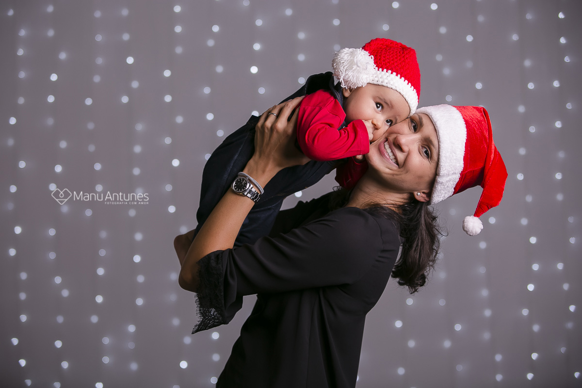 filho no colo da mamãe