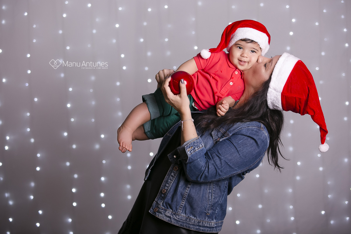 filho no colo da sua mãe