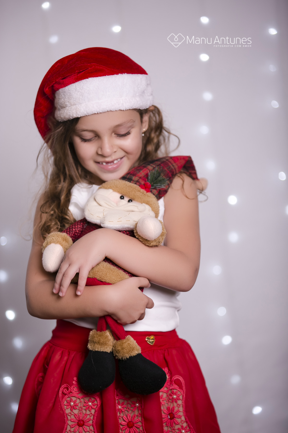 menina com papai noel