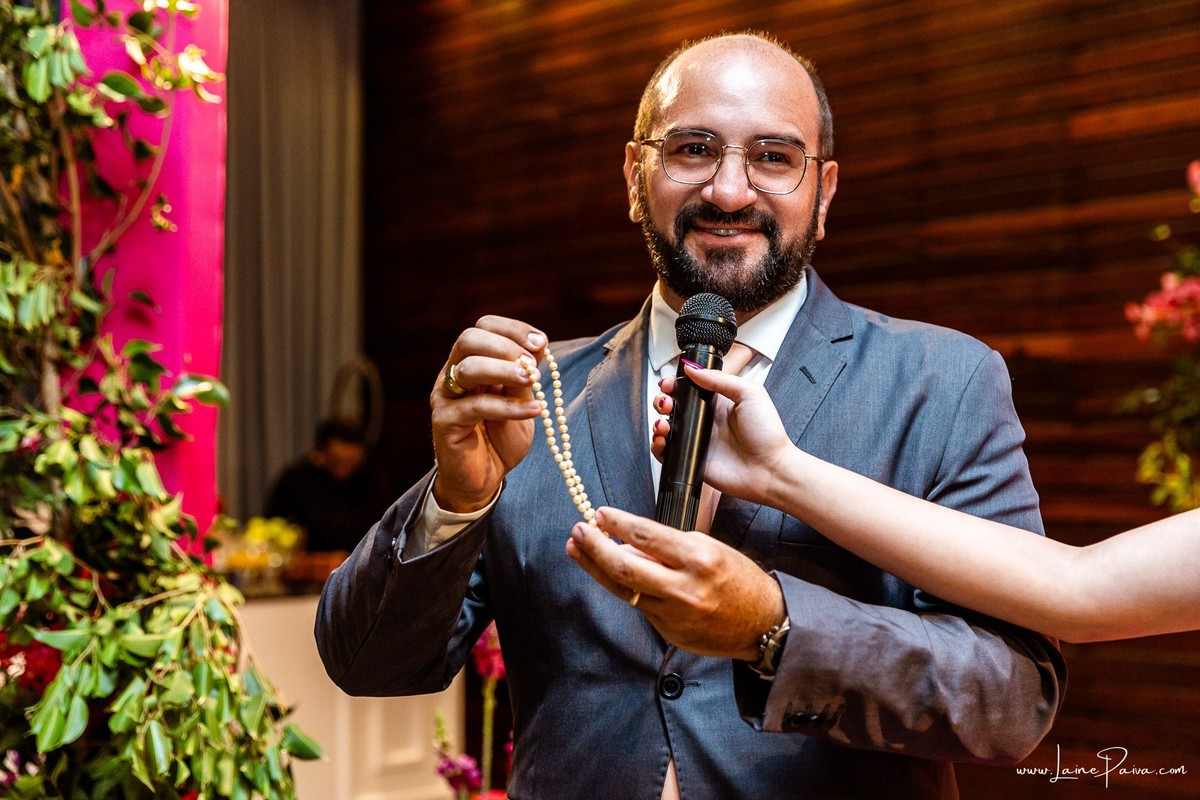 fotografia de Aniversario de adolescente, festa de 15 anos de Isabela no restaurante Nau em Natal, debutante, com homenagem e muito carinho de familiares e amigos.