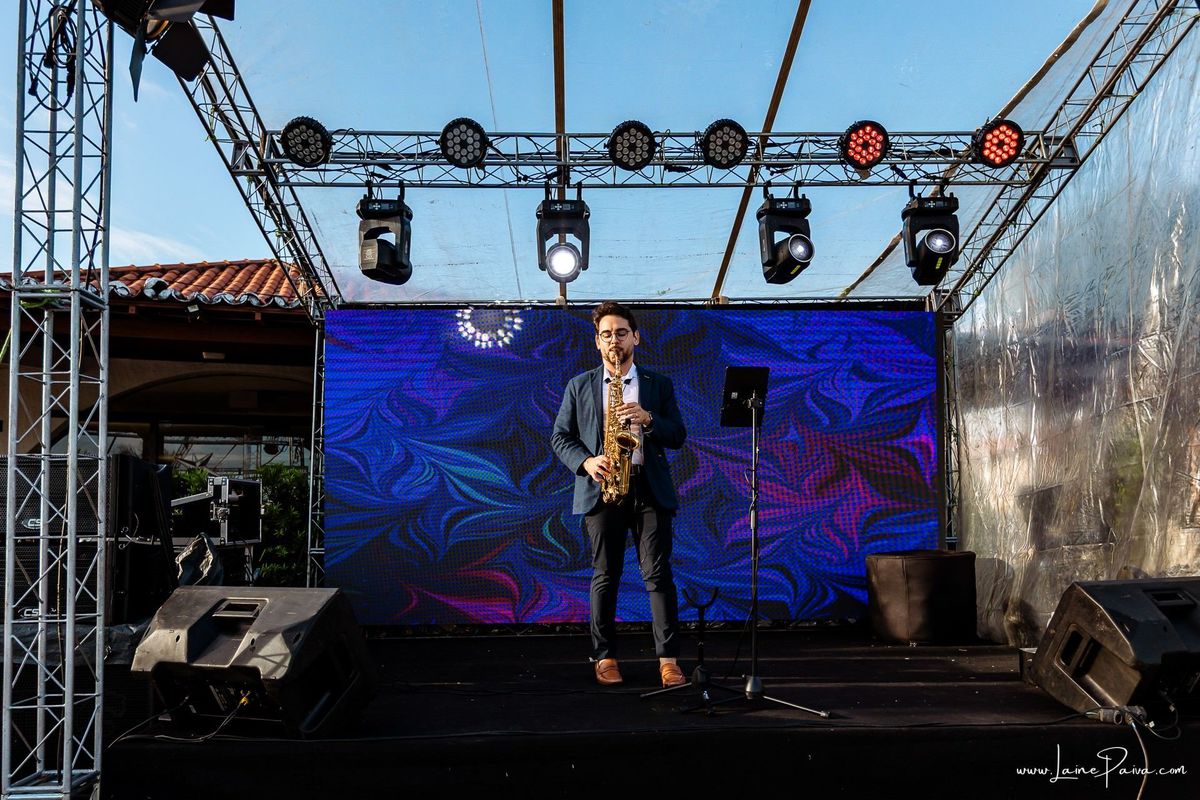 fotografia de Aniversario adulto, festa de 60 anos de Marcelo no Iate Clube em Natal, no fim de tarde com por do sol e a banda de Thiago Novaes, homenagem e muito carinho de familiares e amigos. 