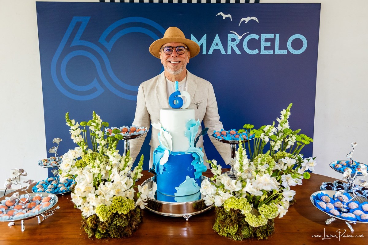 fotografia de Aniversario adulto, festa de 60 anos de Marcelo no Iate Clube em Natal, no fim de tarde com por do sol e a banda de Thiago Novaes, homenagem e muito carinho de familiares e amigos. 