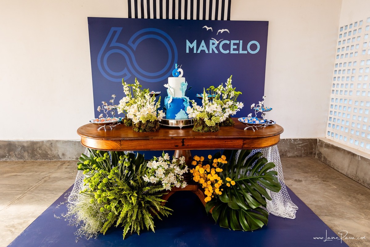 fotografia de Aniversario adulto, festa de 60 anos de Marcelo no Iate Clube em Natal, no fim de tarde com por do sol e a banda de Thiago Novaes, homenagem e muito carinho de familiares e amigos. 