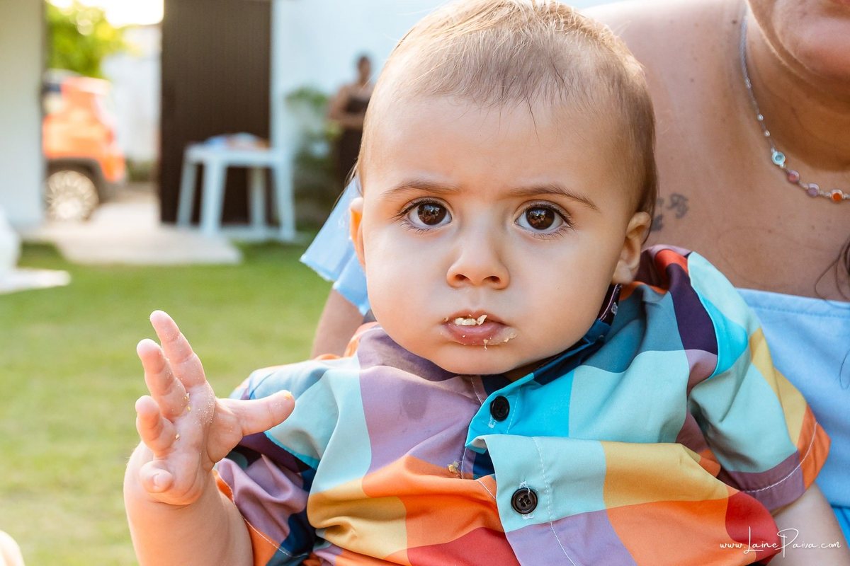 fotografia de Aniversario infantil, festa de 1 ano de Raul no Celebrar Receções em Parnamirim, com tema primeira volta ao sol, brincadeiras, piscina, piquinique diversão para as crianças e muito carinho de familiares e amigos.