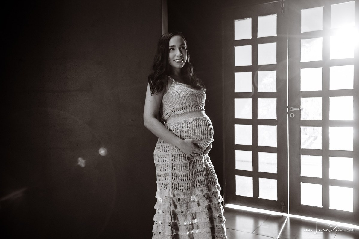 Fotografia de gestante no Complexo da Rampa, em Natal, com Dayza celebrando a chegada de Maria Isadora. Um ensaio de gravidez marcado por afeto, conexão e a beleza do pôr do sol no Rio Potengi