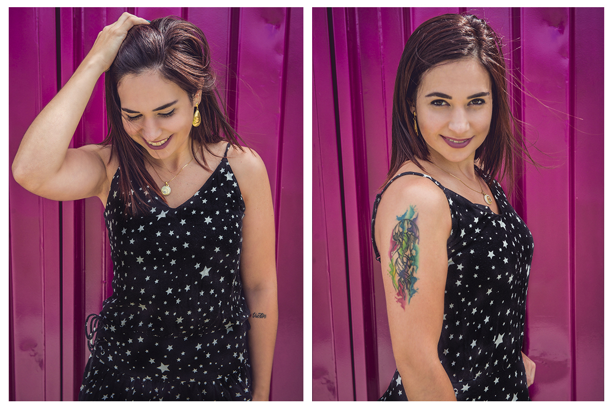 Linda foto da aniversariante no Parque UNa com um vestido preto com fundo roxo. Foto por Marco Moscarelli