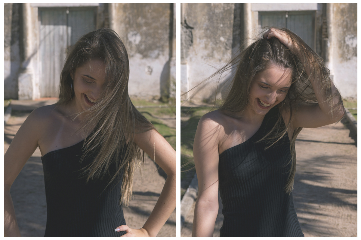 Fotografia da debutante com a mão no cabelo com uma pequena igreja ao fundo durante o seu ensaio fotográfico na praia da capilha. Foto por Marco Moscarelli Fotografo.