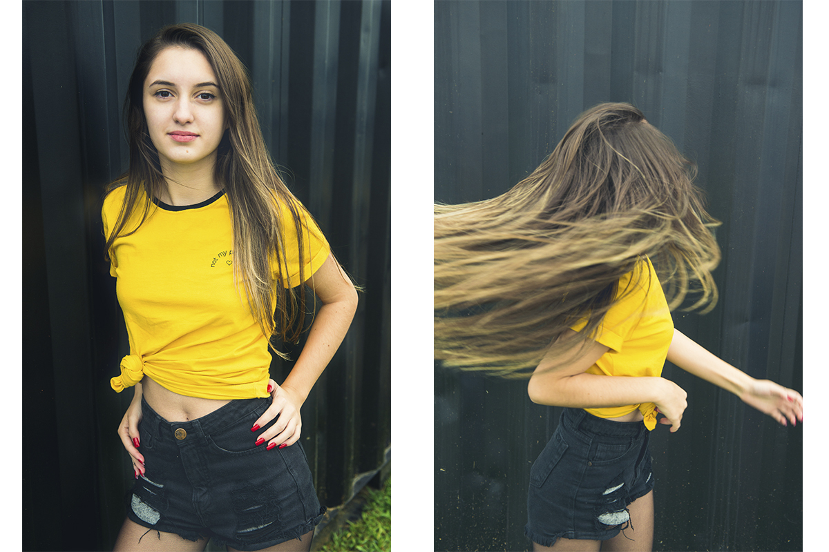 Debutante rindo divertidamente e fazendo diversas poses durante seu ensaio fotográfico de 15 anos. Foto por Marco Moscarelli Fotografo.