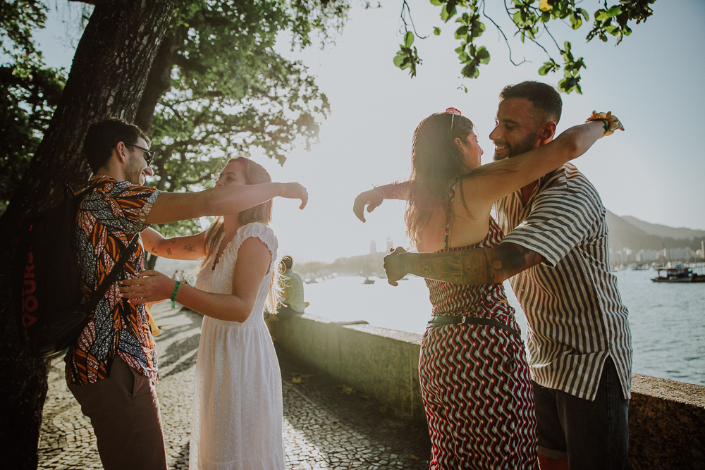 Bride gets emotional with surprise marriage proposal at Dona Marta viewpoint, one of the most beautiful places in the city of Rio de Janeiro, which has views of Cristo Redentor and Sugar Loaf, engagement ring, wedding ring RJ, noivado champagne