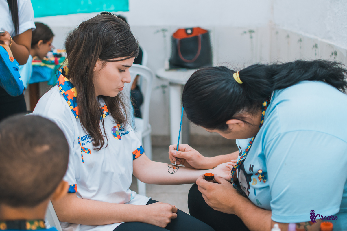 Evento de conscientização do dia mundial do autismo, realizado na chácara do servidor de mauá. Fotografia TEA, fotógrafo PCD, evento sobre inclusão social.