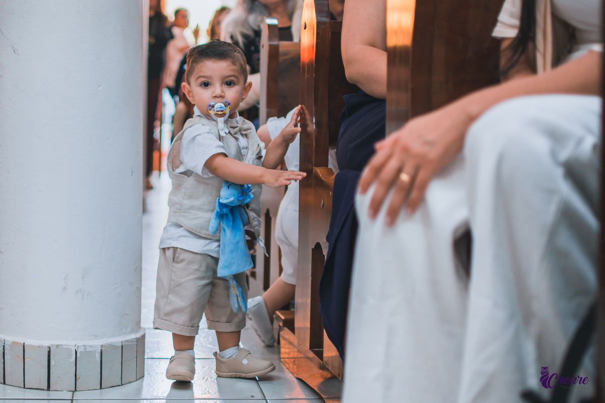 fotografia de batizado realizada na Paróquia São José Operário em Mauá, ABC Paulista. Fotógrafo Infantil em Mauá.