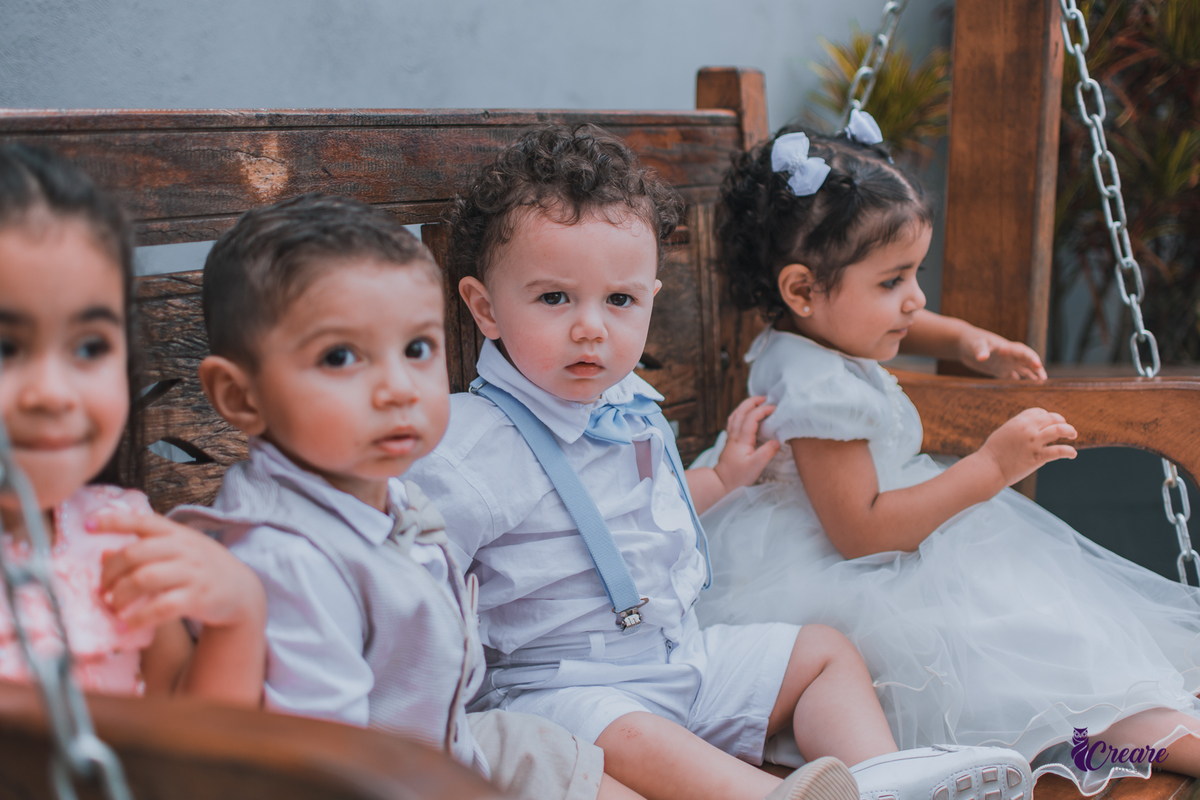 fotografia de batizado realizada na Paróquia São José Operário em Mauá, ABC Paulista. Fotógrafo Infantil em Mauá.