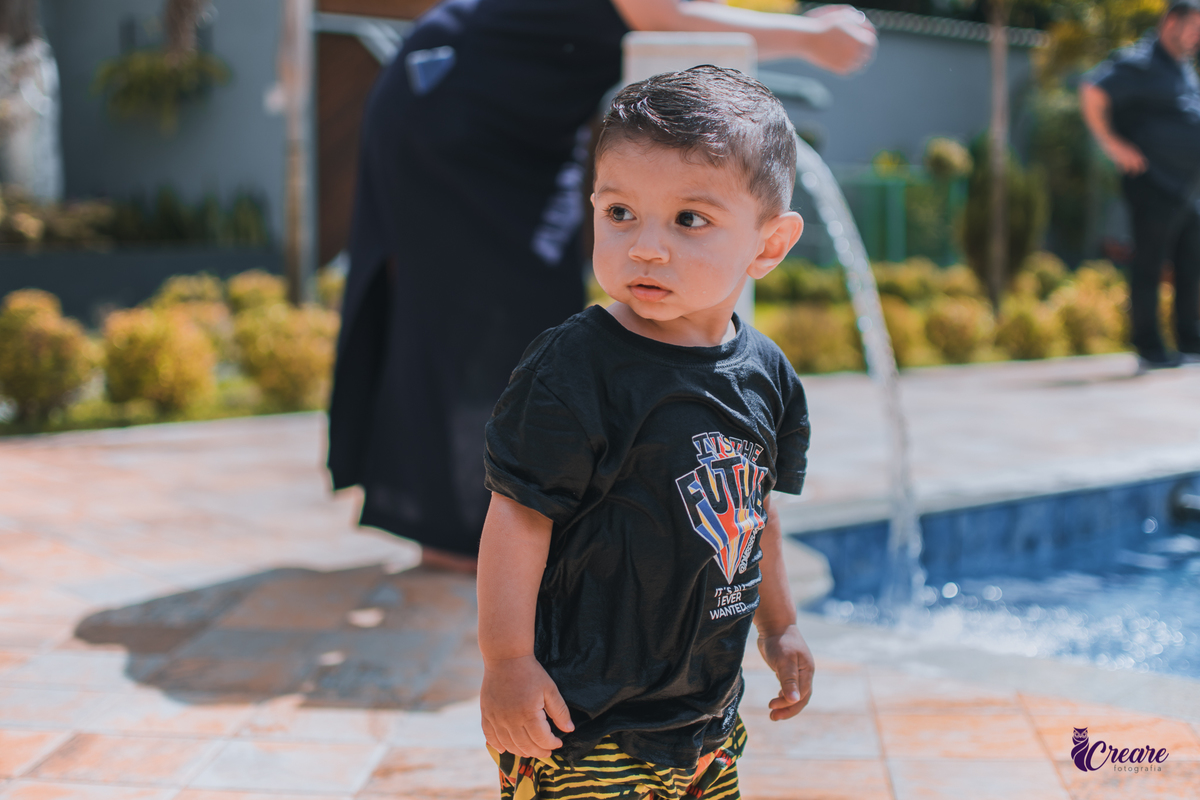 fotografia de batizado realizada na Paróquia São José Operário em Mauá, ABC Paulista. Fotógrafo Infantil em Mauá.