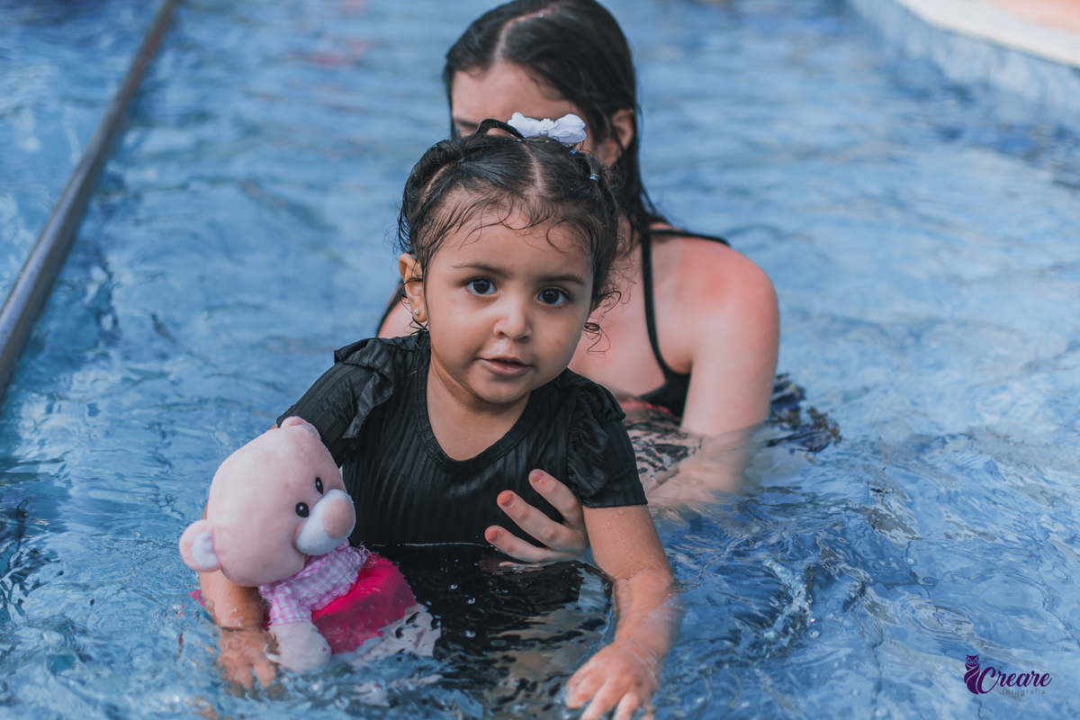 fotografia de batizado realizada na Paróquia São José Operário em Mauá, ABC Paulista. Fotógrafo Infantil em Mauá.
