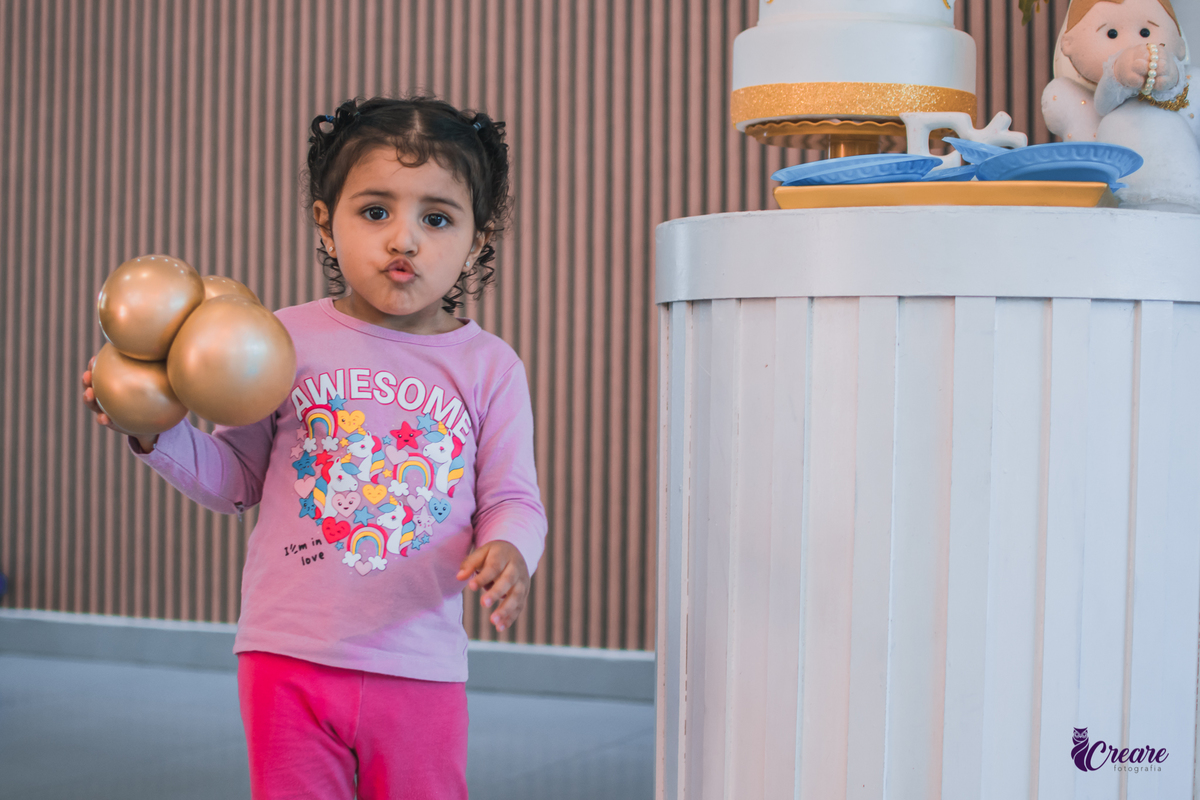 fotografia de batizado realizada na Paróquia São José Operário em Mauá, ABC Paulista. Fotógrafo Infantil em Mauá.