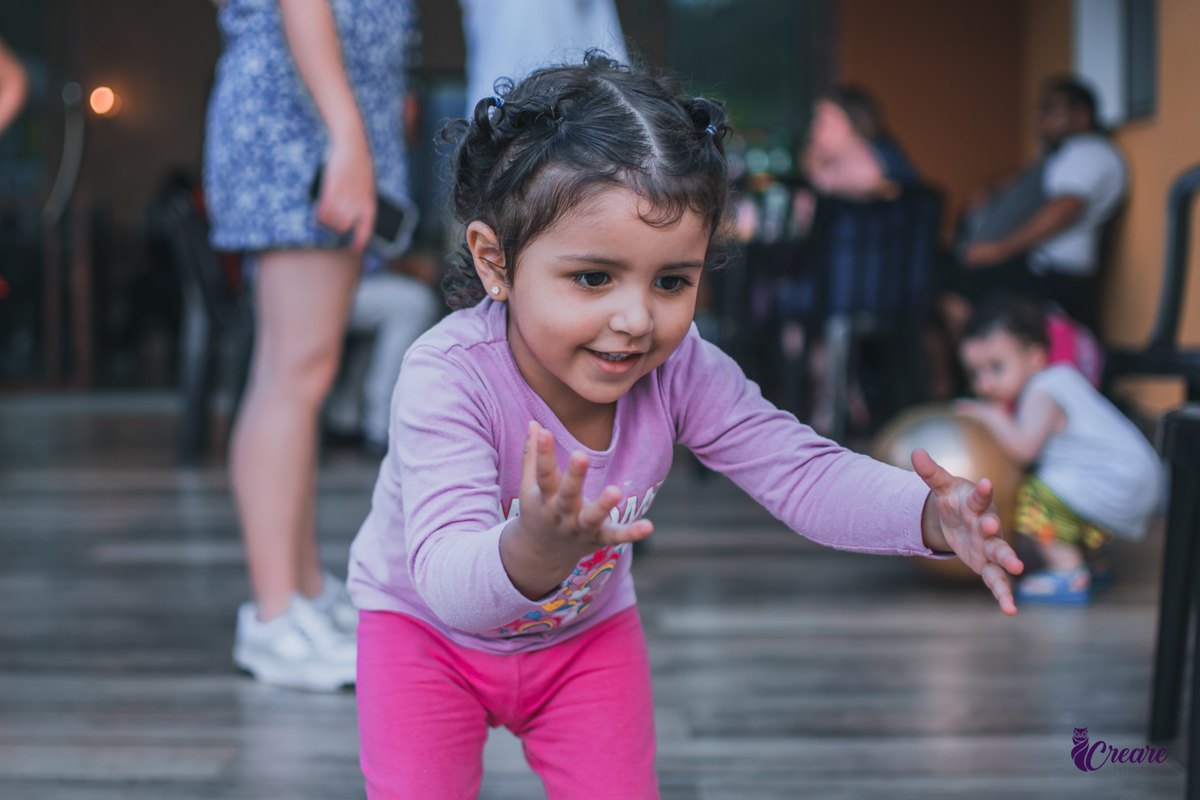 fotografia de batizado realizada na Paróquia São José Operário em Mauá, ABC Paulista. Fotógrafo Infantil em Mauá.