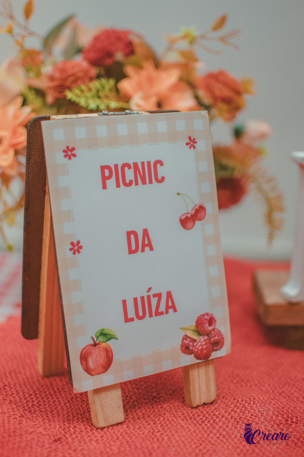 Placa de madeira, escrito Pic nic da Luíza.