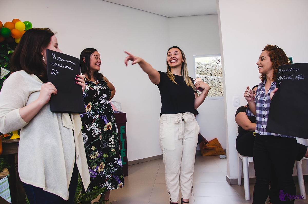 fotografia de chá de fraldas, decoração e eventos. tema safari. fotografia espontânea, de família. gestante. 