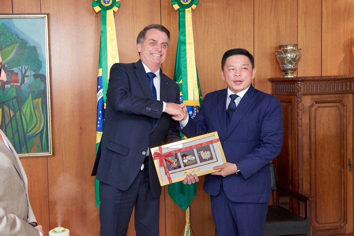 fotos com o presidente Bolsonaro com o primeiro ministro da malásia