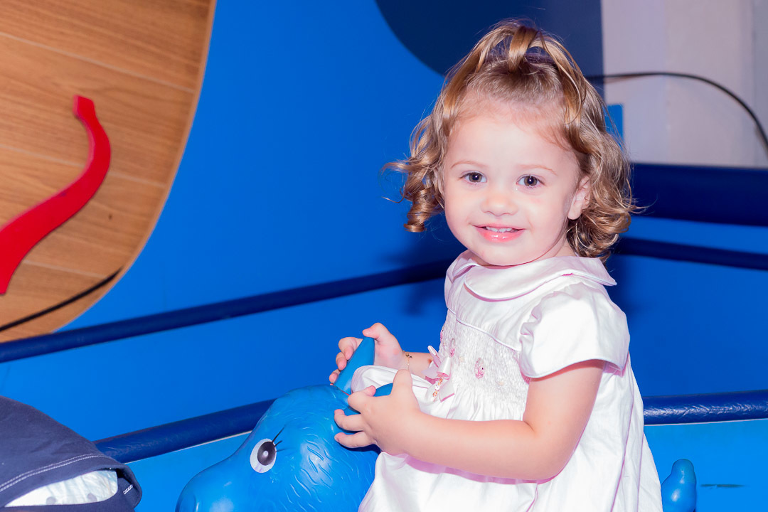 Fotografia da aniversariante brincando 