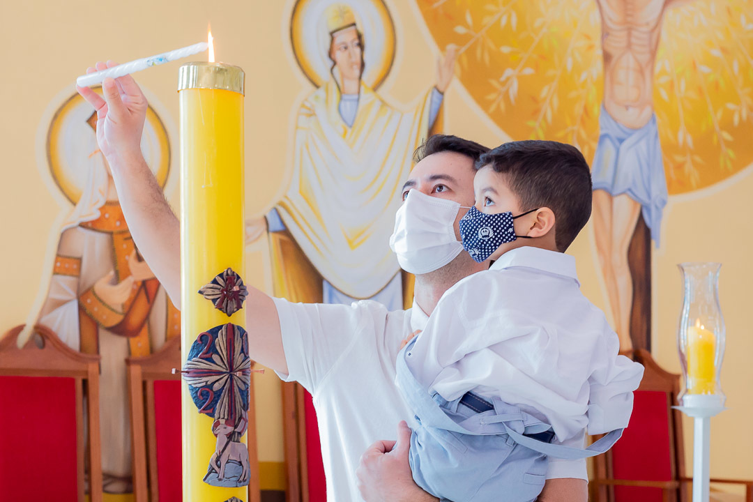 Fotografia de batizado momento da vela