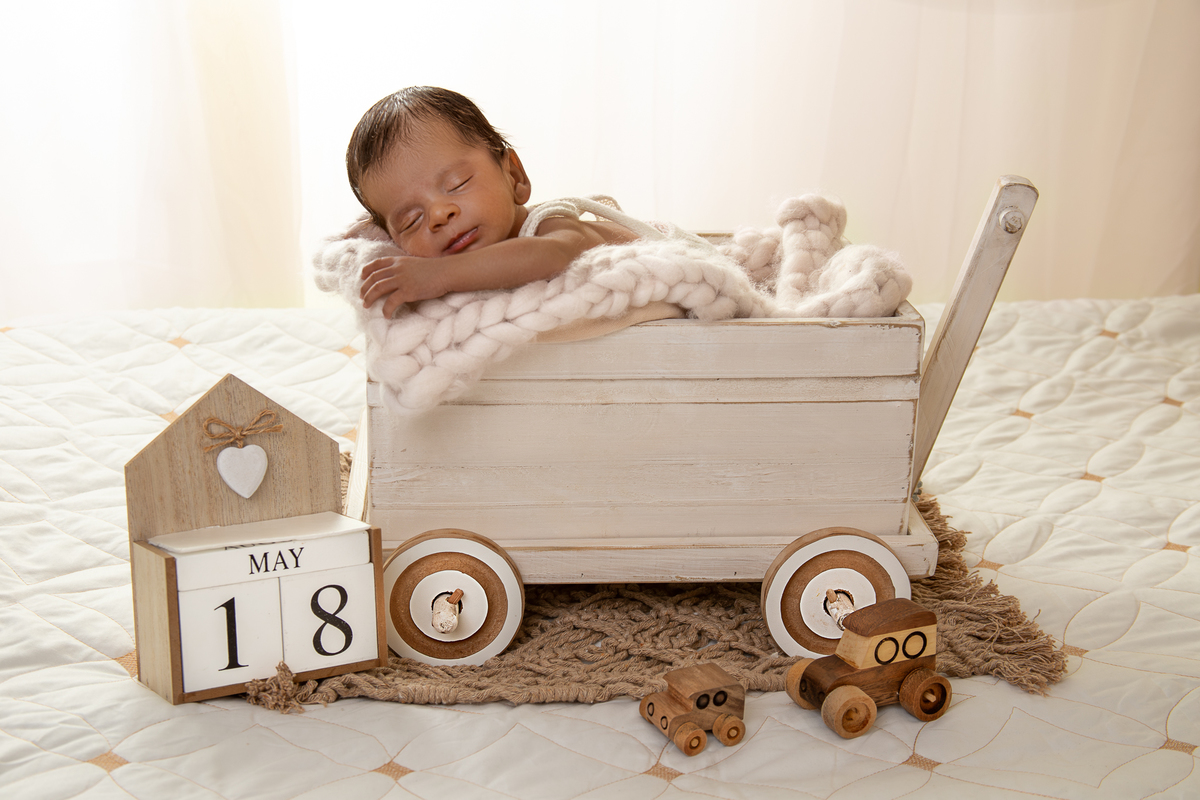 Carrinho no ensaio newborn