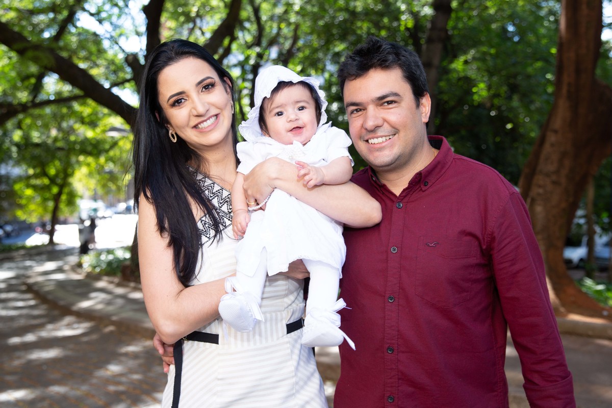 Pais e criança, Luiza que será batizada.