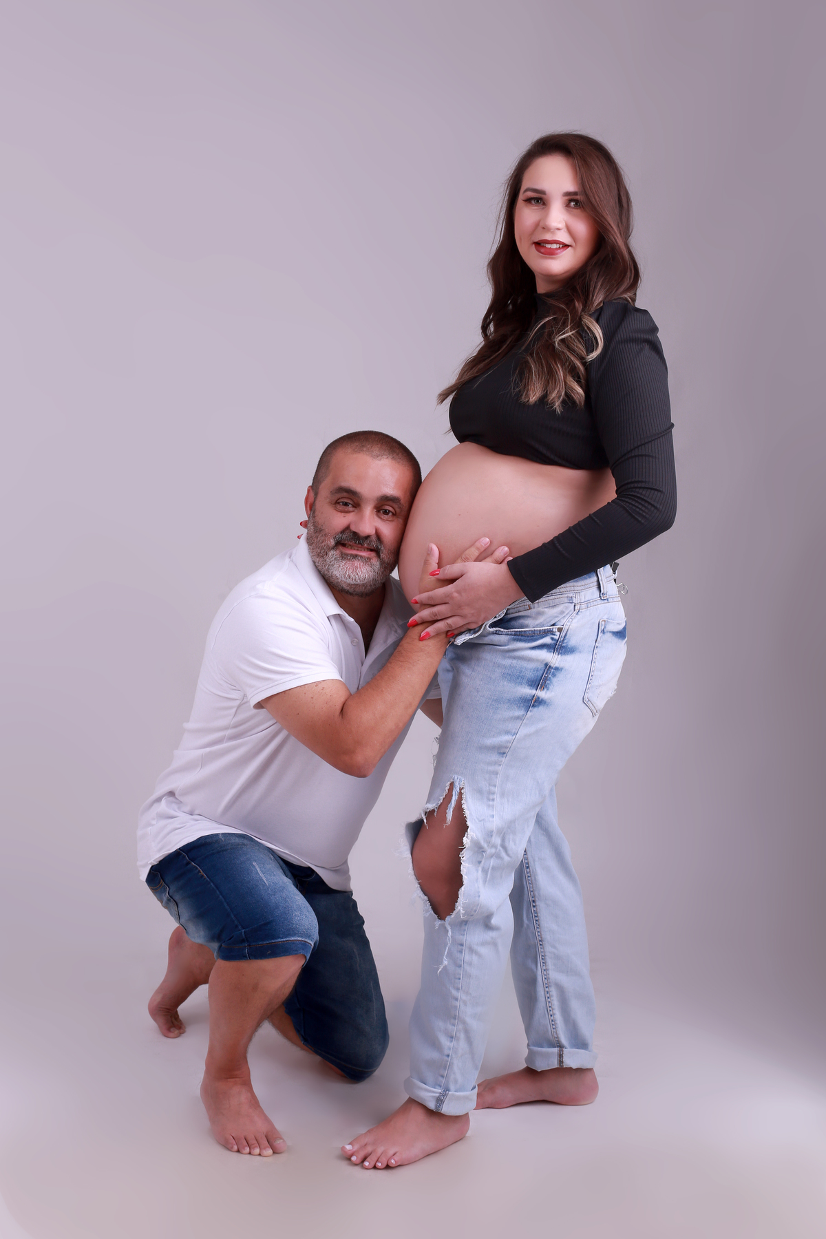 Ensaio de gestante com o marido.