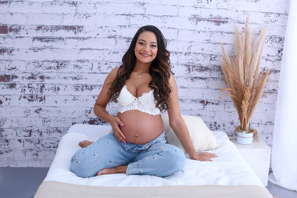 ensaio de gestante na cama
