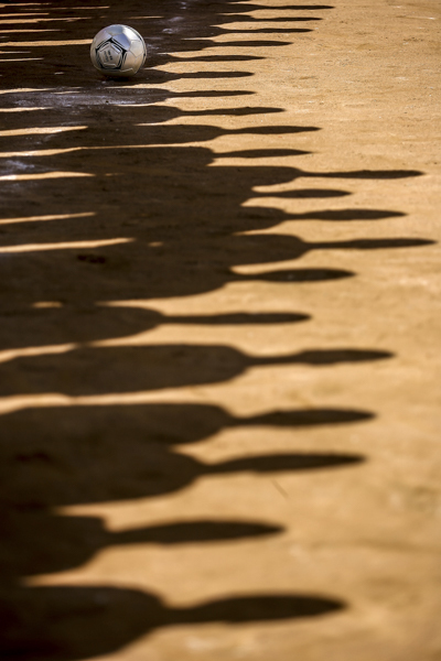 Sombra dos times de futebol durante partida