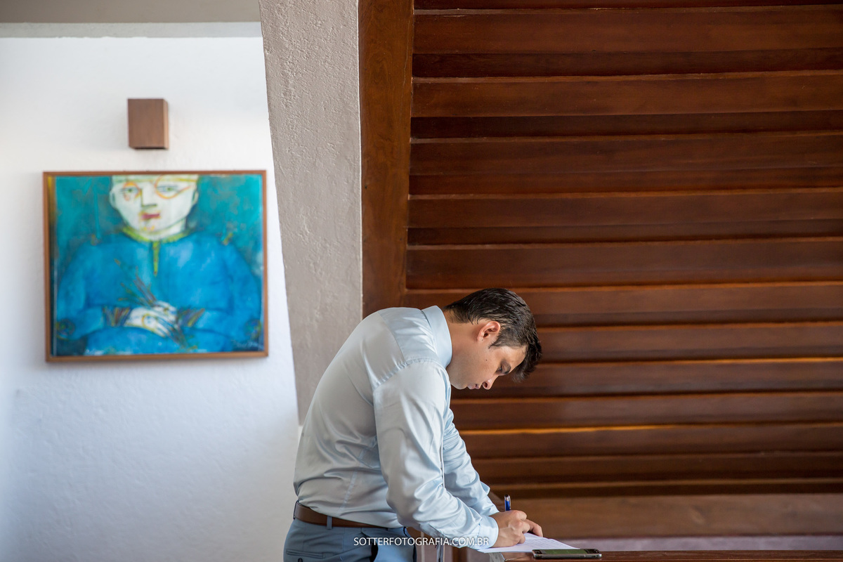 NOIVO ESCREVENDO OS VOTOS SOTTER FOTOGRAFIA 