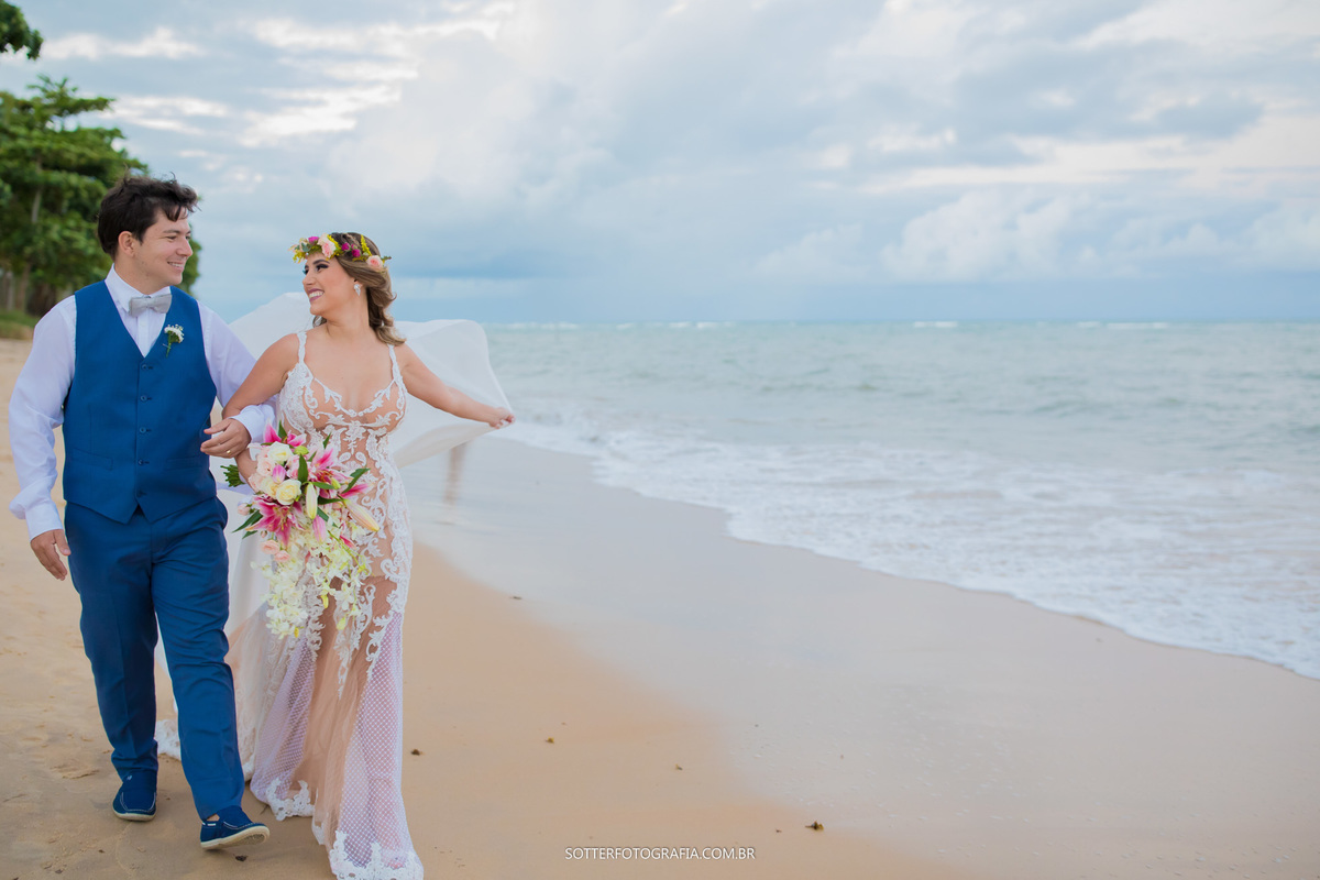 noivos casamento na praia  mar buque da noiva lirios sotter fotografia