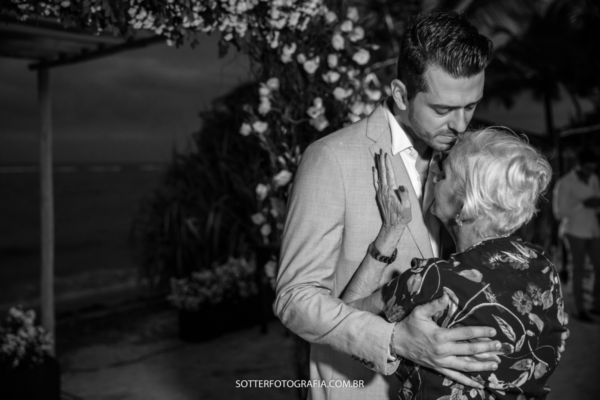 noivo emocionado com familiares sotter fotografia