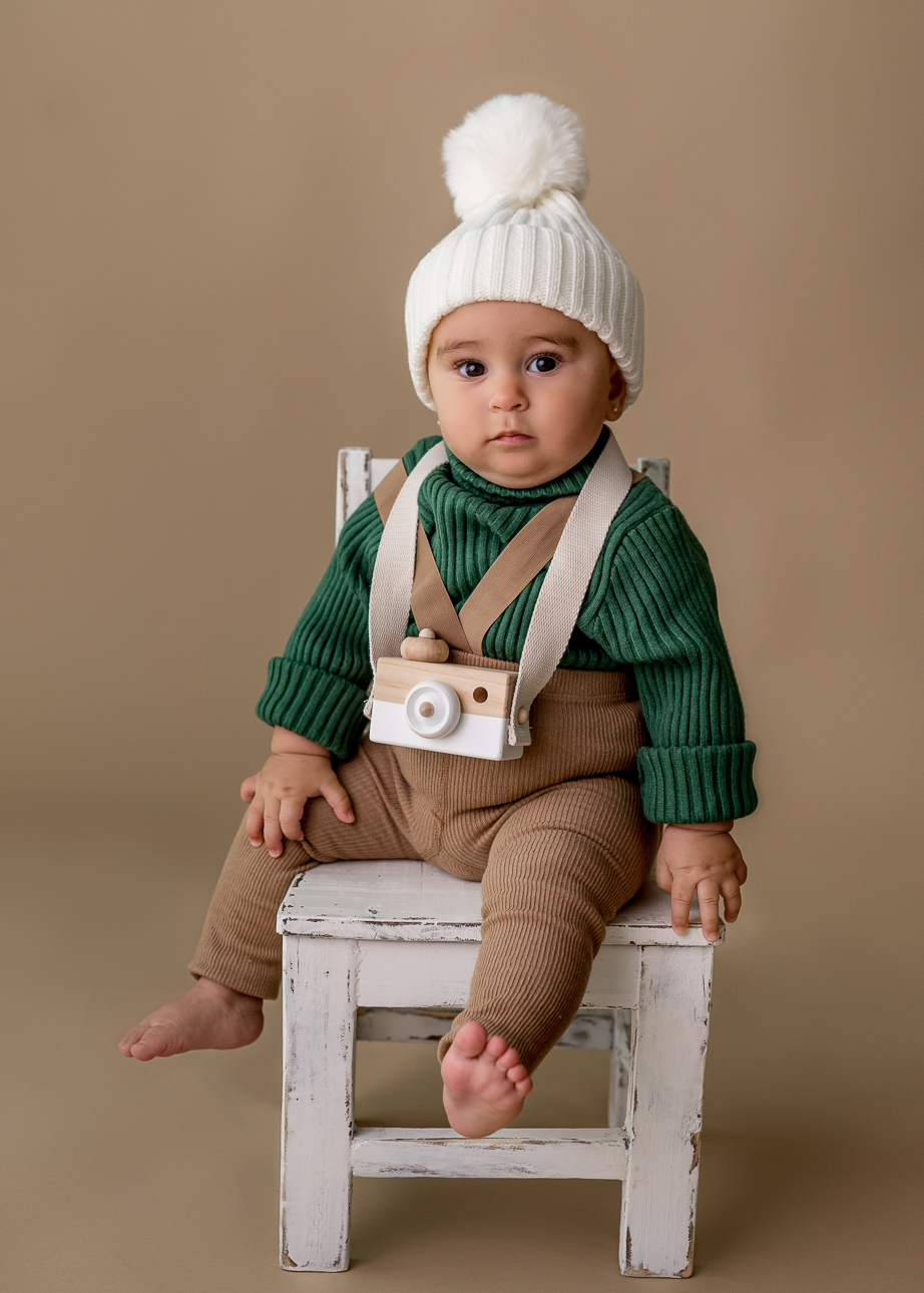 ensaio infantil com roupa de inverno