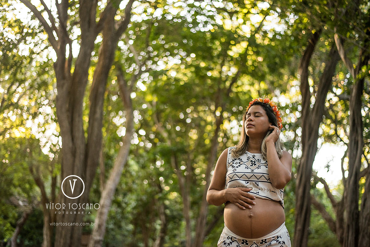 Gestante gardênia no ensaio fotográfico no parque das dunas.