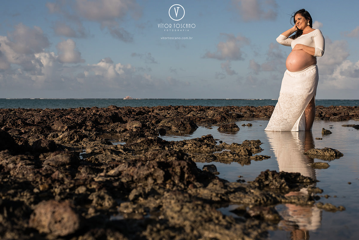 Gestante Flaviane durante o ensaio de gestante em Natal RN com vitor toscano