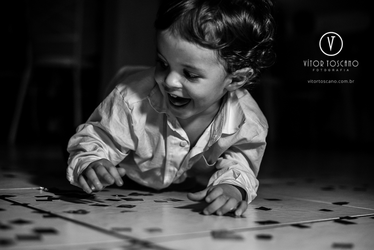 Criança sorrindo no casamento de Andre e Laudiceia, em Natal-RN.