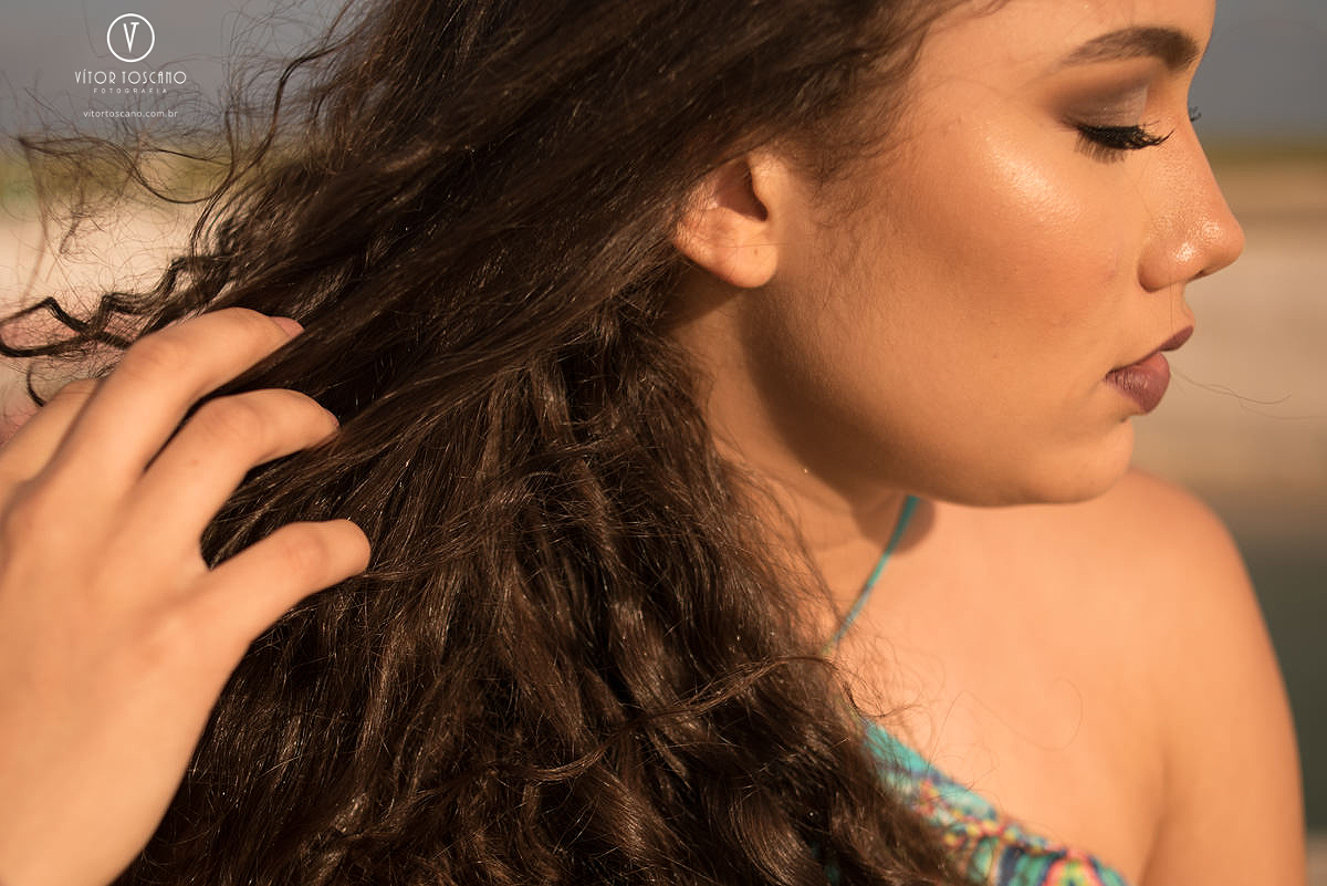 Detalhe da mão no ensaio de 15 anos de Marina em Barra de Cunhau - RN.