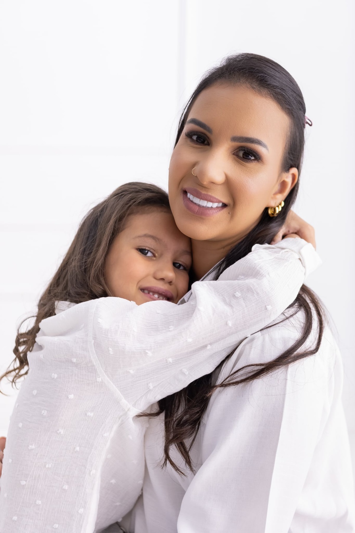 Ensaio de família em estúdio. Fotografo em Londrina especializado em ensaios de bebes, família e crianças. Momento registrado pela fotografa.