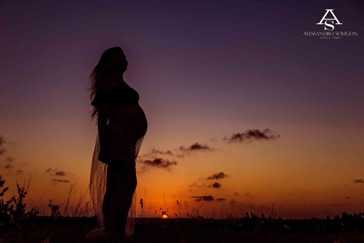Gravida no por do sol
