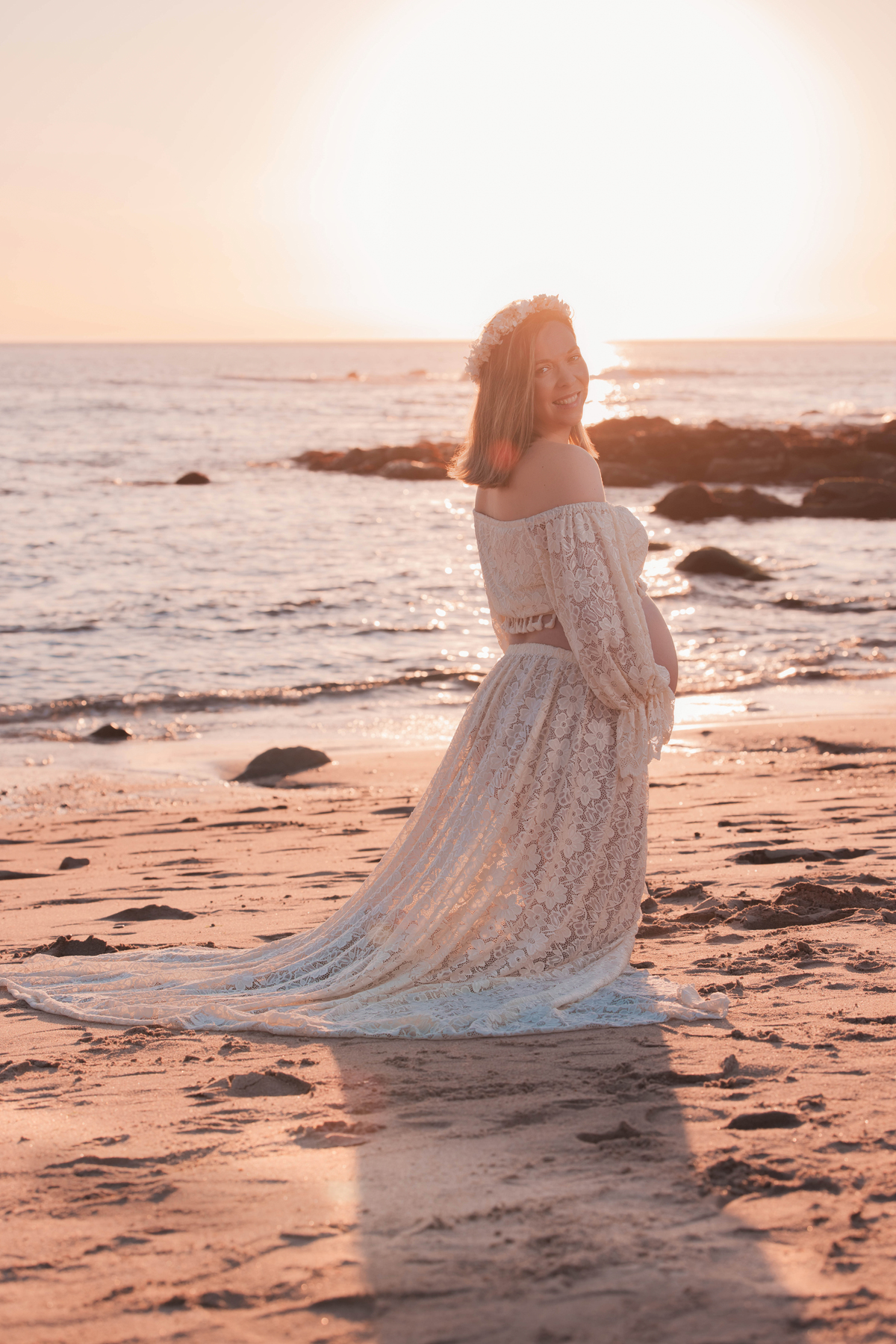 foto gravida ao por do sol 